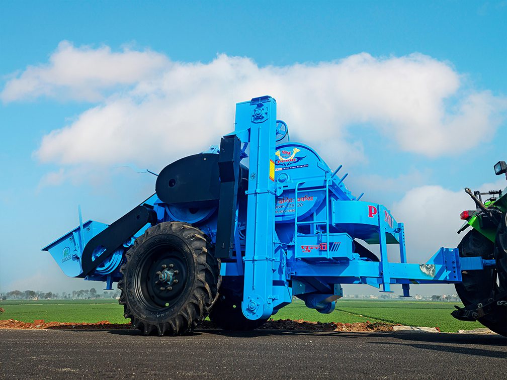 multi-crop thresher with tractor attachment seen from the side