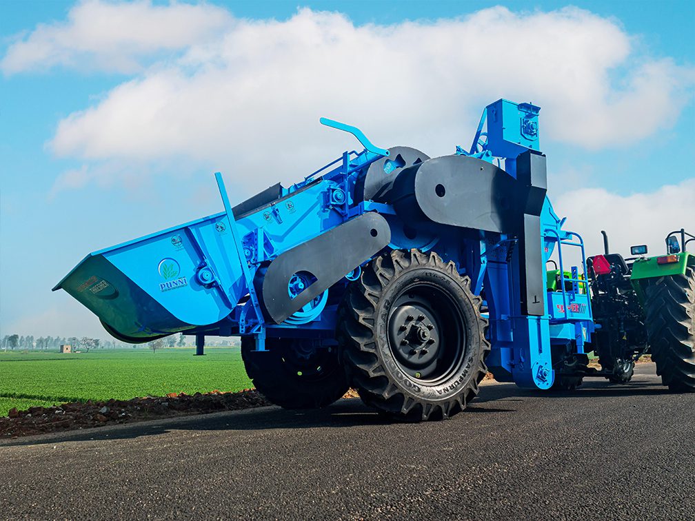 multi crop thresher with a tractor attachment